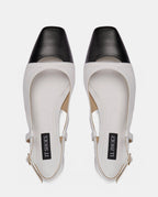 zapatos blancos old money para mujer con puntera negra