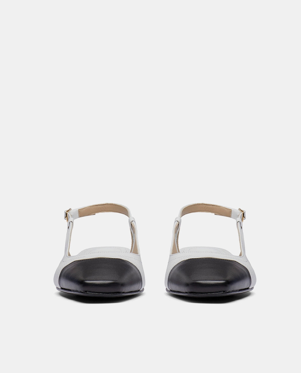 zapatos blancos old money para mujer con puntera negra