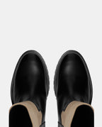 puntas botas camperas altas beige y negro