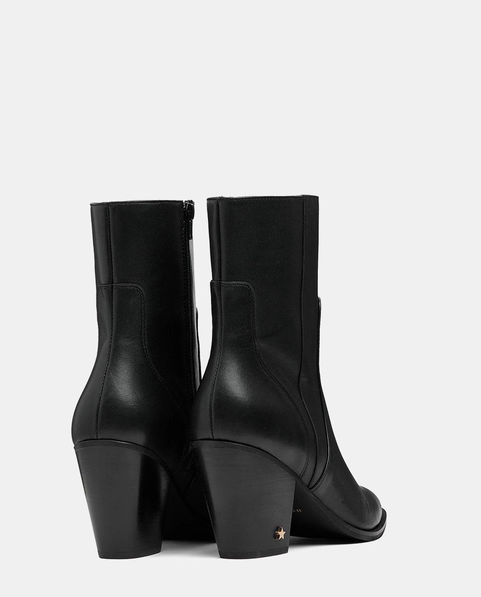 botas negras piel media caña