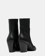 botas negras piel media caña