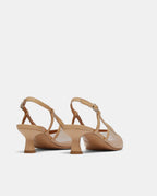 sandalias con tacón en piel nude y semitransparentes