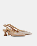 sandalias nude semitransparentes con  tacón medio