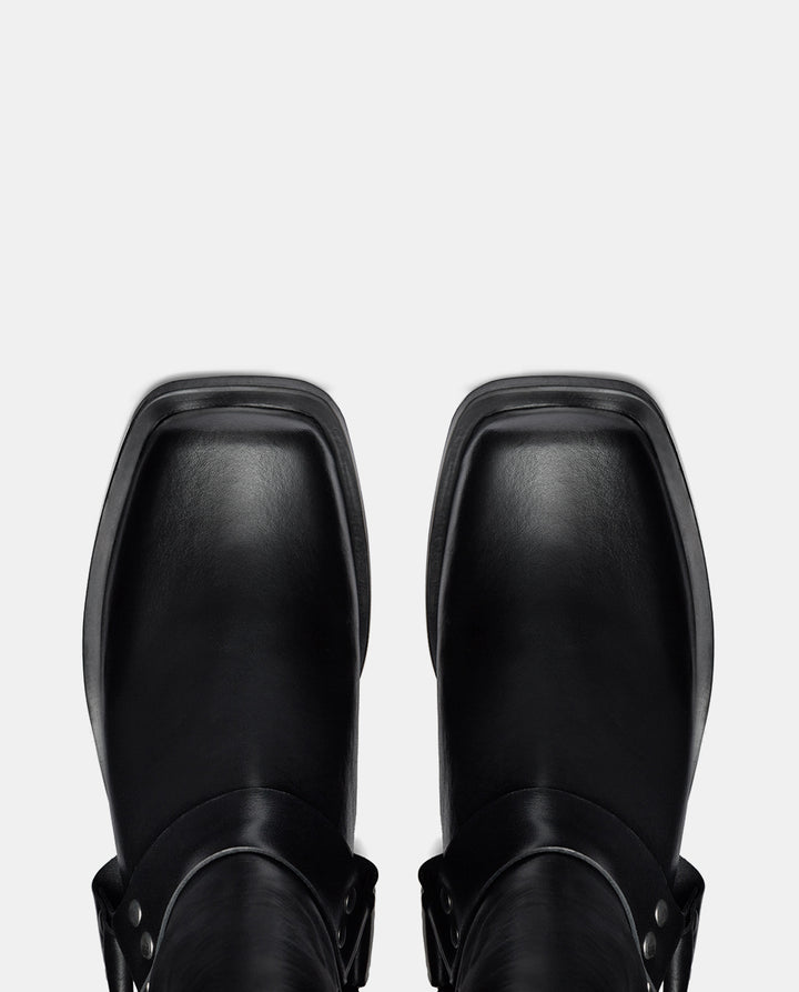 Puntera de botas moteras color negro para mujer